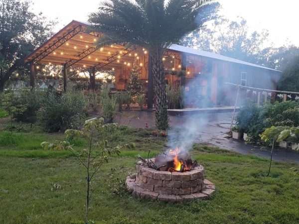 Cahaba Clubs Herbal Outpost - View of Barn at Dusk with Fire Pit